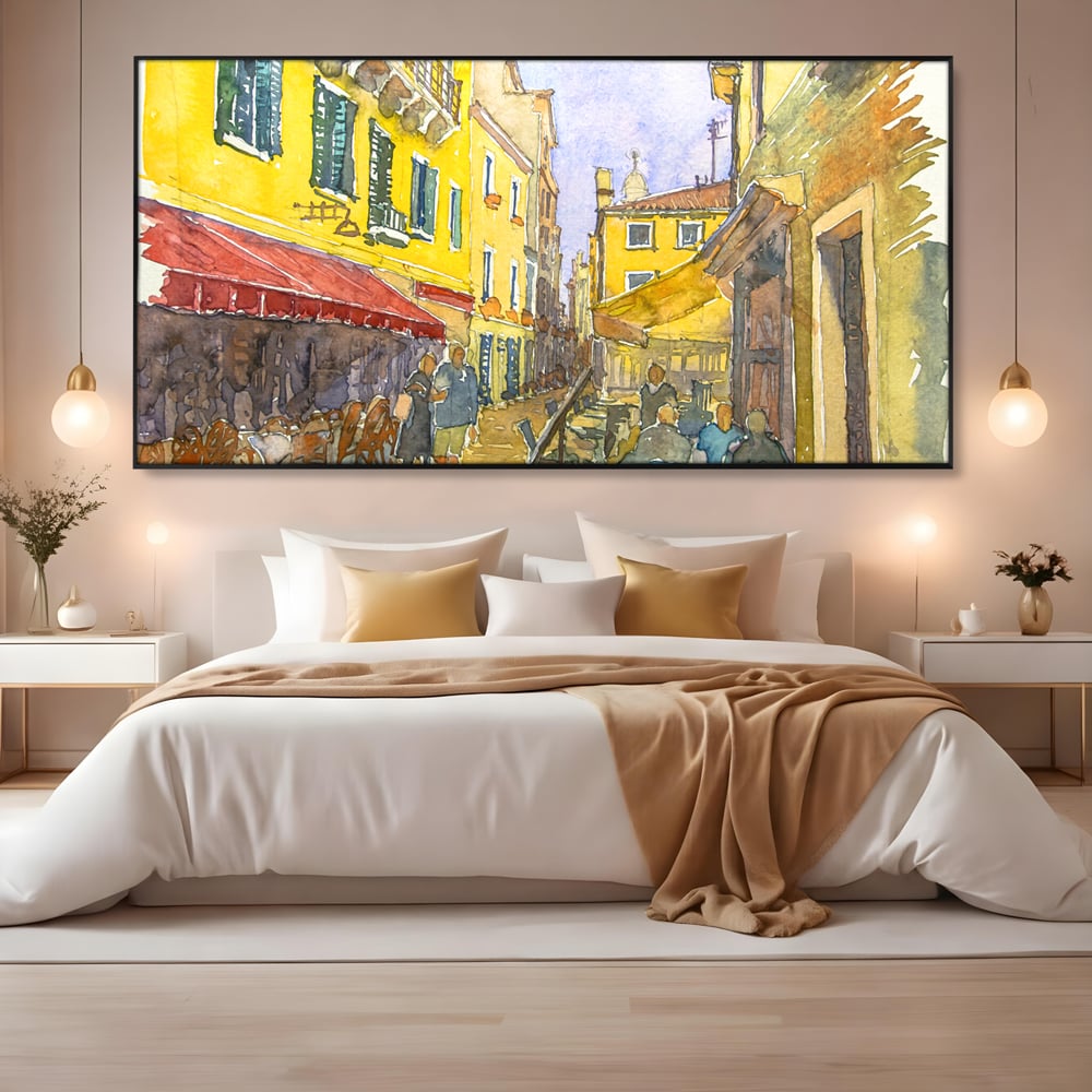 Tablou canvas cu pictura acuarela strada cu terase, in rama de aluminiu negru, pe perete intr-un dormitor